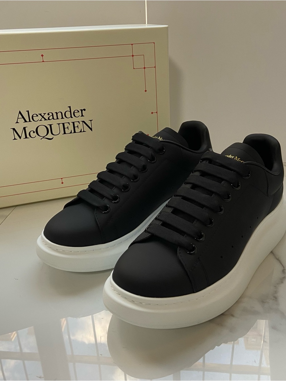 Alexander McQueen Black Leather Sneakers with White Platform Sole